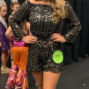 Good used condition black romper with gold and silver sequins